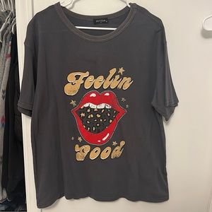 oversized tee, minor stain but in person blends in better with the color